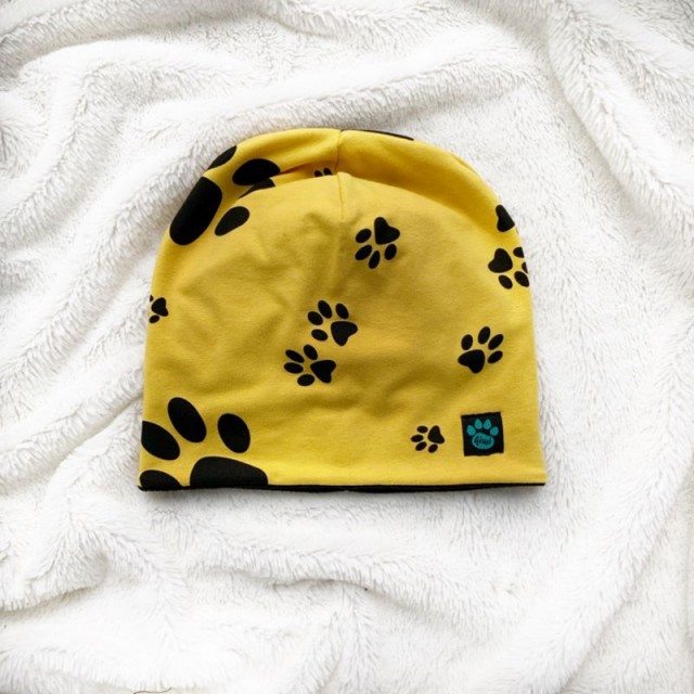 Detská zimná zateplená čiapka ČIERNE PACKY horčicová